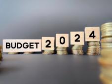 Wooden blocks spelling out BUDGET 2024