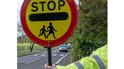 close up of lollipop lady's stick